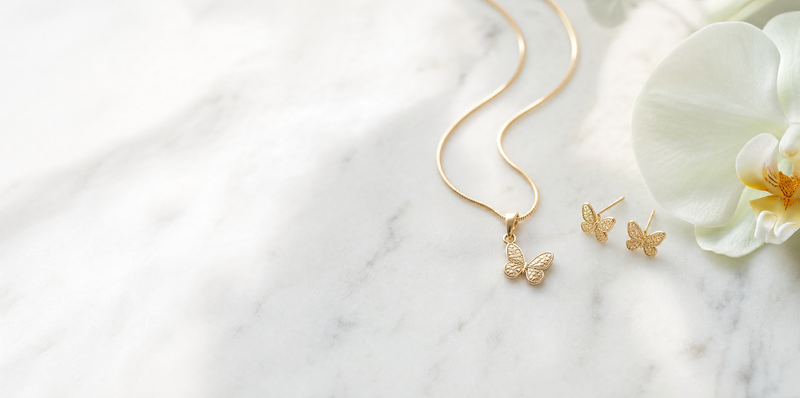 Pendant sets from Rs 30 - butterfly pendant with matching studs